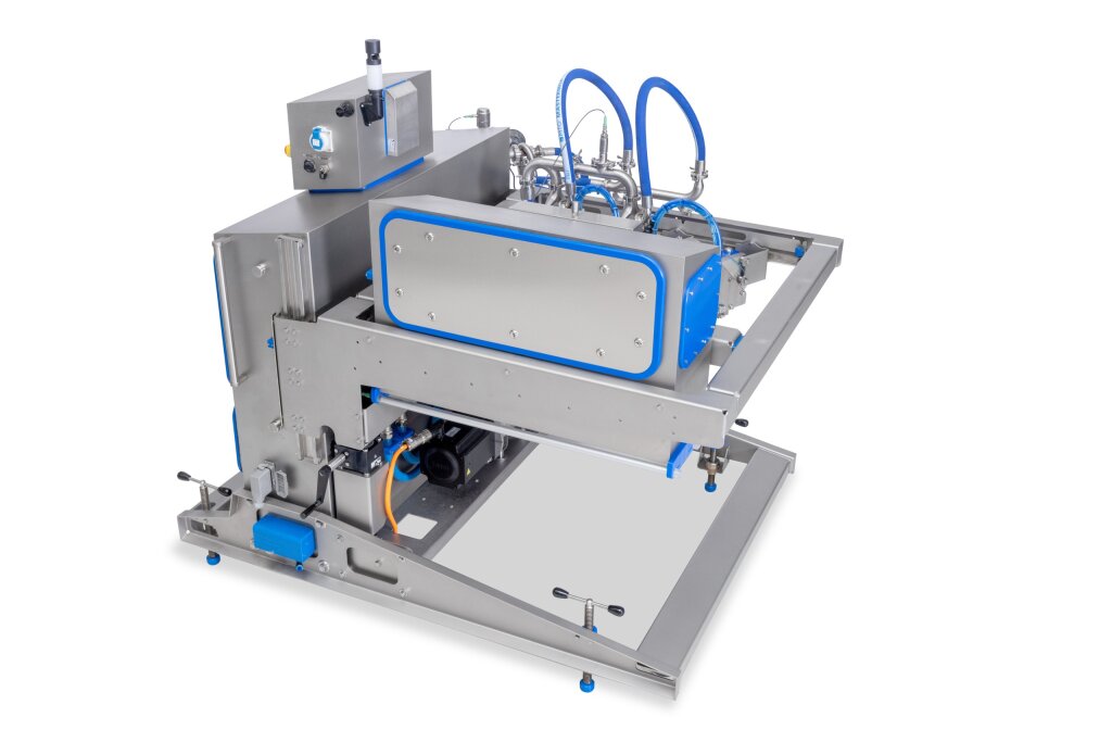 FoodJet MDM600 depositing machine with a stainless steel frame and blue trim, front side view